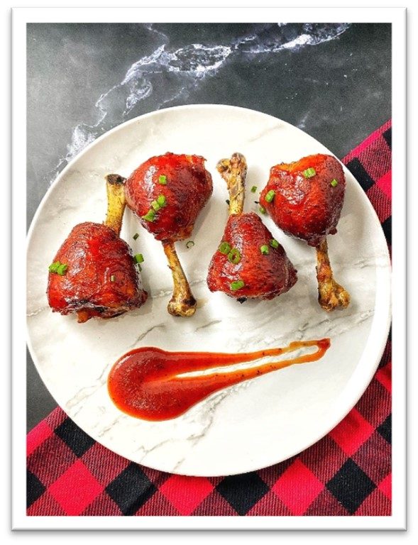 Delicious chicken drumsticks with Best Damn BBQ sauce