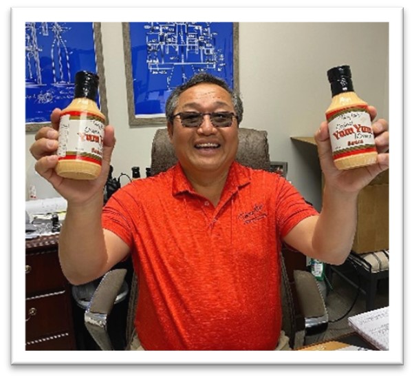 Terry Ho showing off his famous Yum Yum sauce