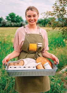 Growing your local community- woman in field