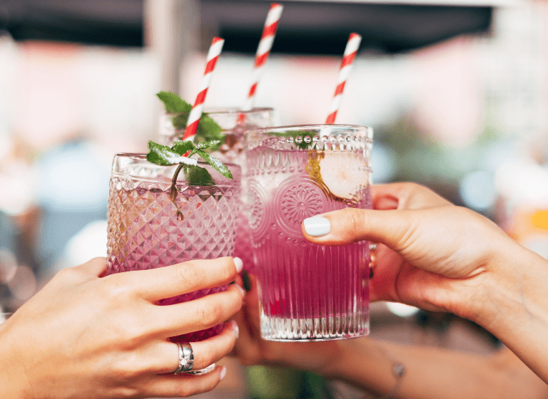 group of people drinking mocktails