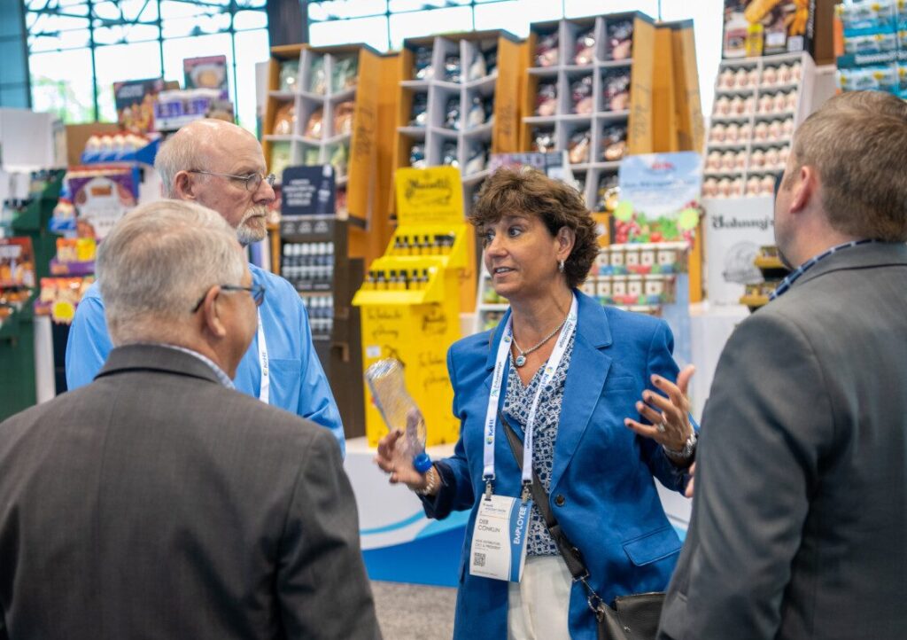 CEO talking on show floor