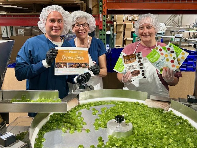 group working in candy factory