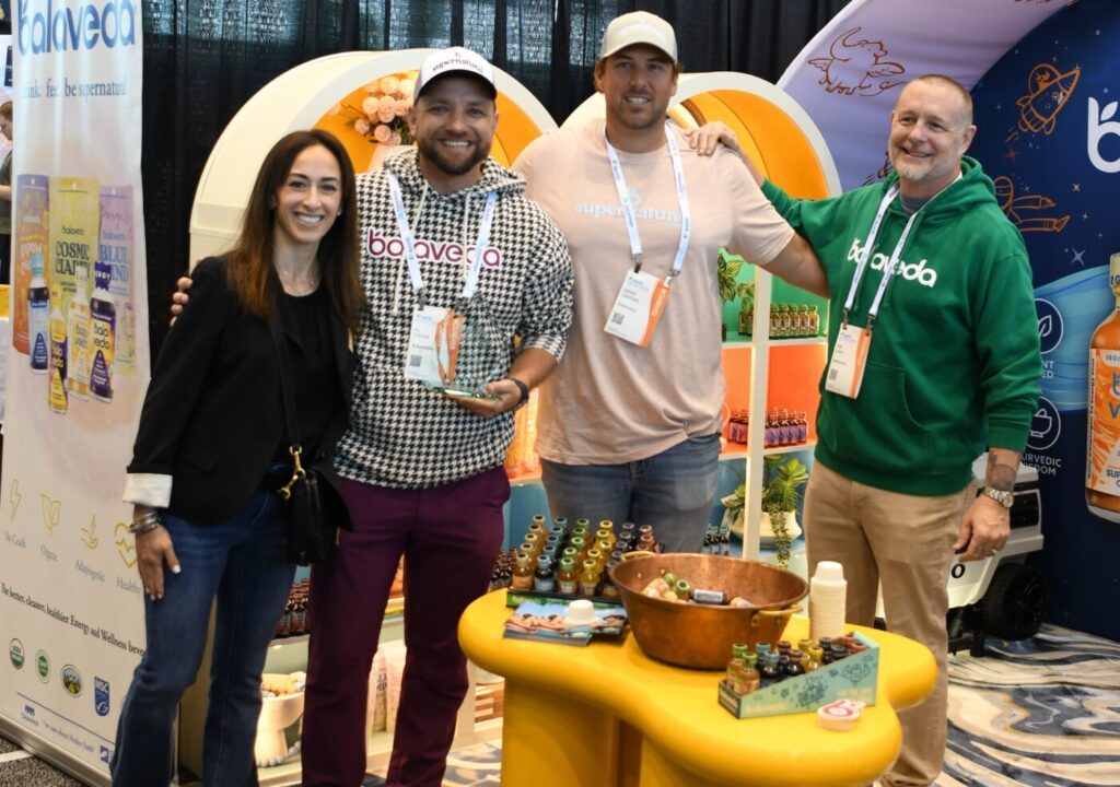 Group receiving booth award at Holiday Show